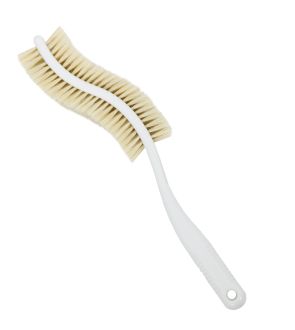 La brosse massante à manche ergonomique